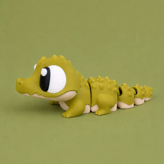 Drilo el Cocodrilo Curioso figura articulada sostenible | Wompy Pals