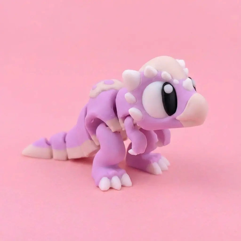 Mochi el Dino Cabeza Bola figura articulada sostenible | Wompy Pals