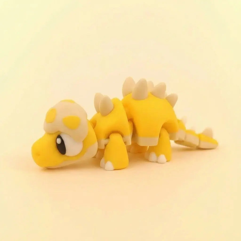 Pico el Estegosaurio Dulzón figura articulada sostenible | Wompy Pals